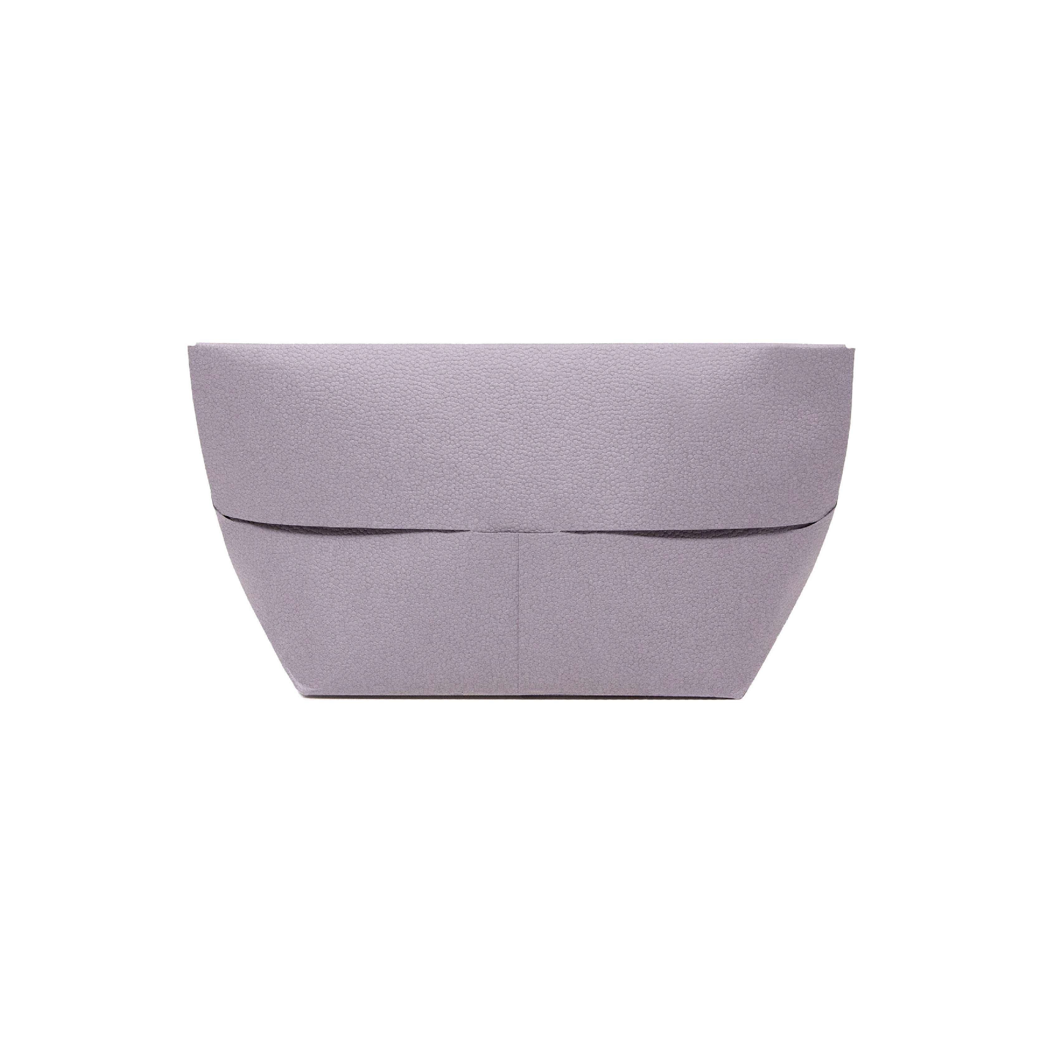 A Paper Bag with the Presence of a Luxury Bag