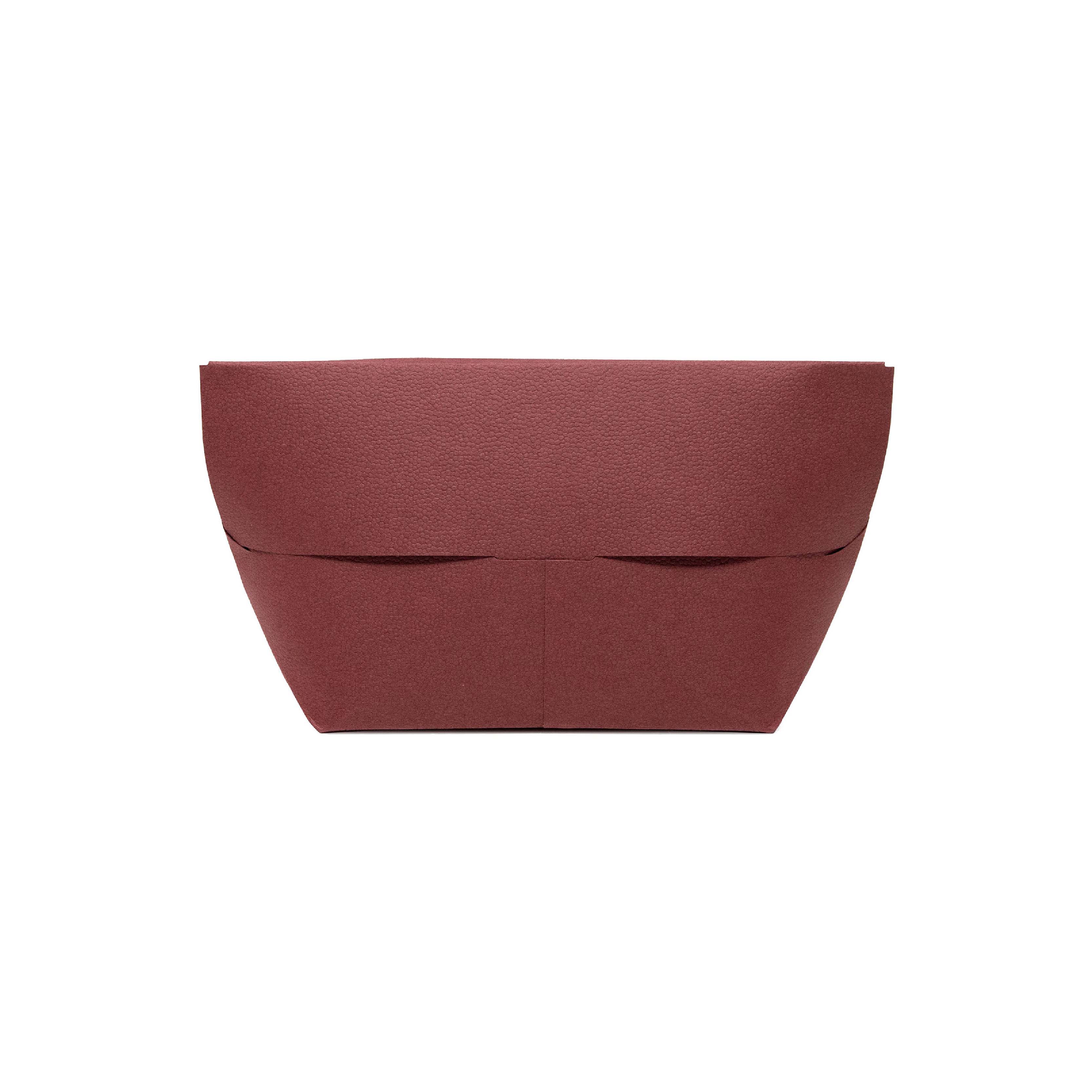 A Paper Bag with the Presence of a Luxury Bag