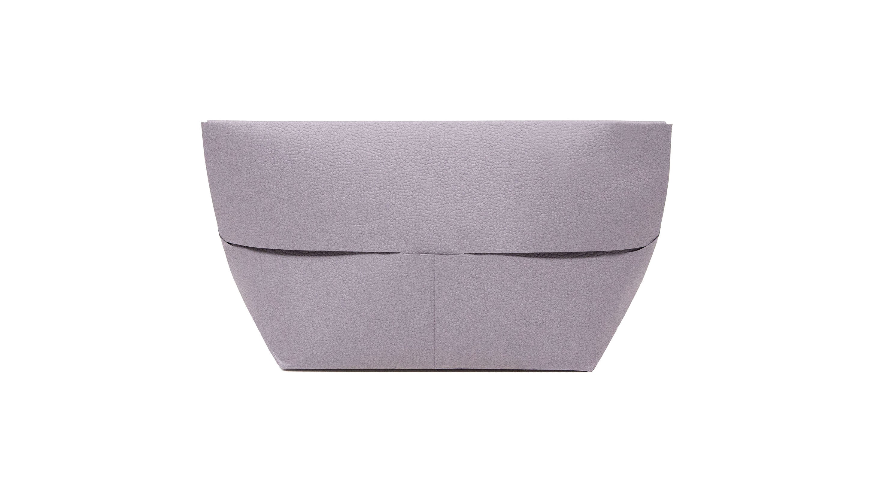 A Paper Bag with the Presence of a Luxury Bag