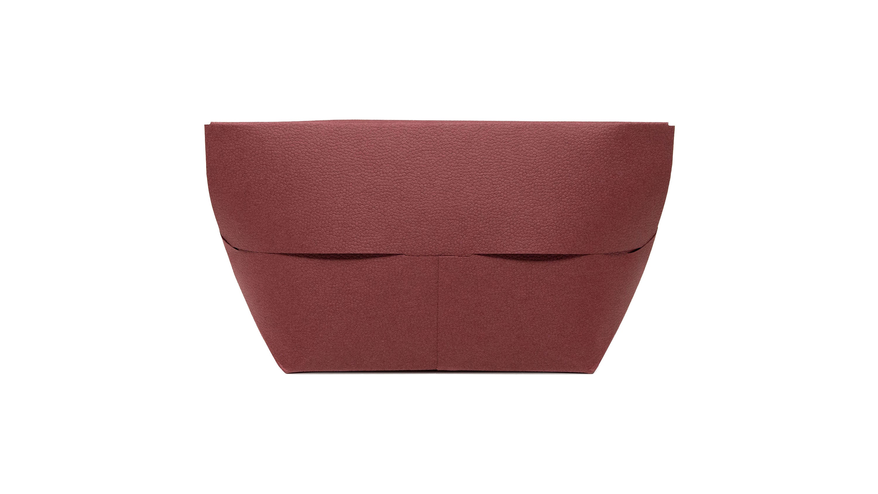 A Paper Bag with the Presence of a Luxury Bag
